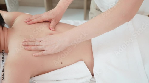 Wallpaper Mural Young Asian woman getting Relaxing oil massage at beauty spa salon. Back massage, Massage for health. Dolly slider Slow Motion Torontodigital.ca