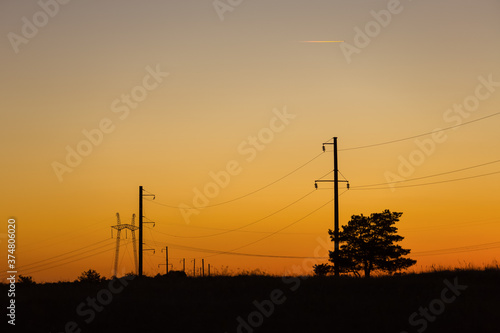 electric power lines in sunset © Alexey Cherenkov
