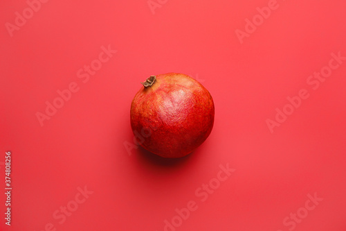 Fresh pomegranate on color background