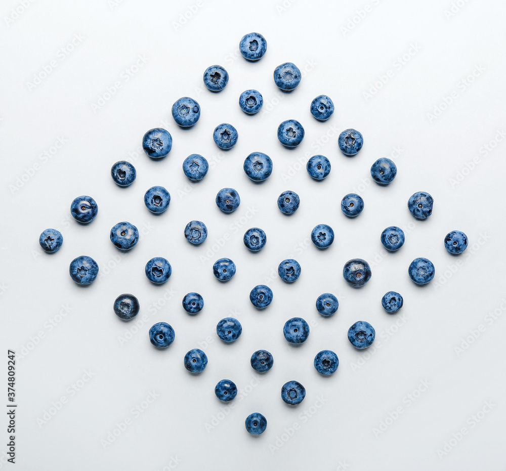 Tasty blueberry on light background Tasty blueberry on light background