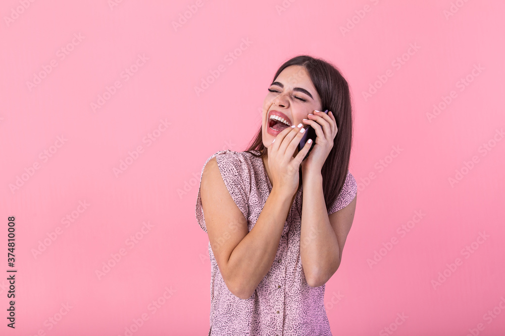 Beautiful teen woman talking on cellphone, making happy surprice face, studio shot. Portrait of a pretty joyful girl in dress talking on mobile phone Beautiful teen woman talking on cellphone, making happy surprice face, studio shot. Portrait of a pretty joyful girl in dress talking on mobile phone