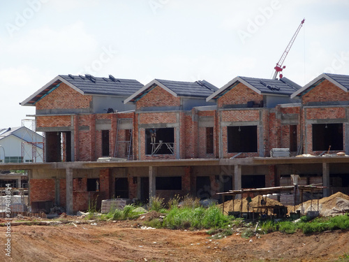 SEREMBAN, MALAYSIA -APRIL 07, 2020: New double story luxury terrace house under construction in Malaysia. Designed by an architect with a modern and contemporary style. 