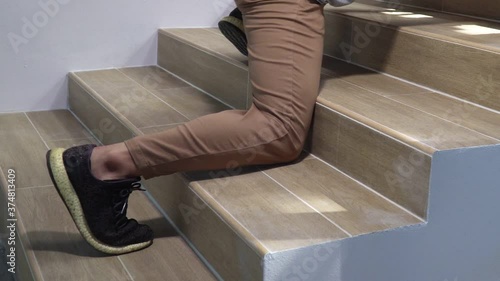 Adult man slip and falling down stair