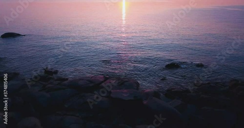 drone over the sea at sunrise