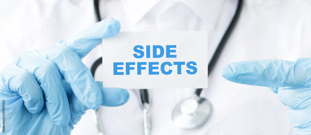 Doctor holding a card with text Side effects medical concept Doctor holding a card with text Side effects medical concept