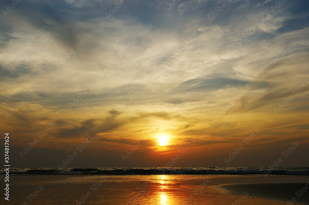 dramatic clouds. Sunset on a tropical island combined with sea and clouds in a dramatic sky dramatic clouds. Sunset on a tropical island combined with sea and clouds in a dramatic sky