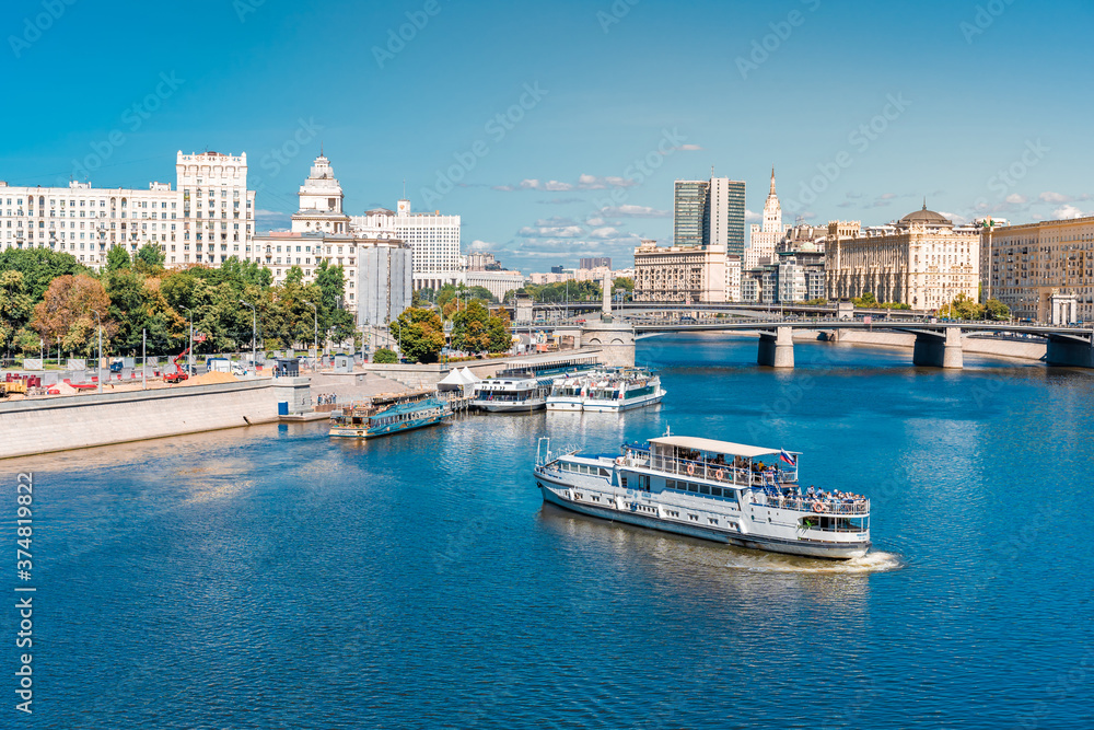 View of the river in Moscow and the embankment, panorama of the city in summer