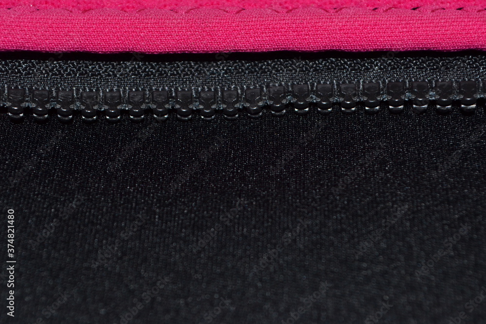 black neoprene fabric with zipper and pink fabric