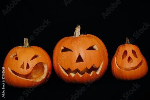 Jack-o ' - pumpkin lantern on dark background for Halloween