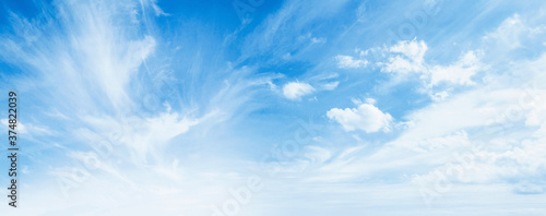 International day of clean air for blue skies concept: Abstract white puffy clouds and blue sky in sunny day texture background photo