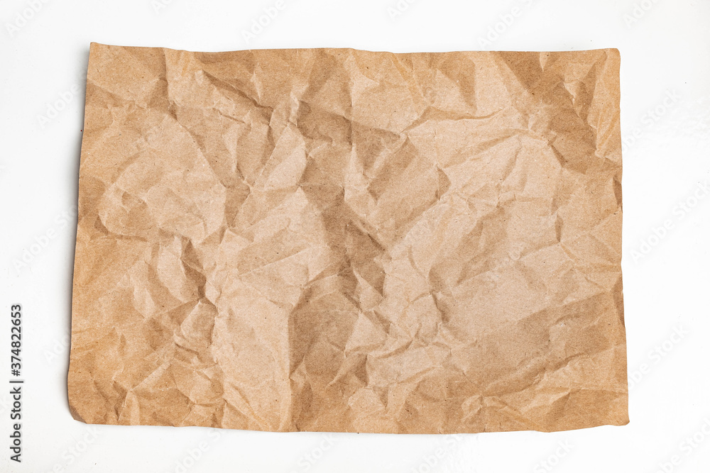 Close up of Recycled brown wrinkle crumpled old with paper page texture rough background. crease grunge parchment pattern vintage design Close up of Recycled brown wrinkle crumpled old with paper page texture rough background. crease grunge parchment pattern vintage design