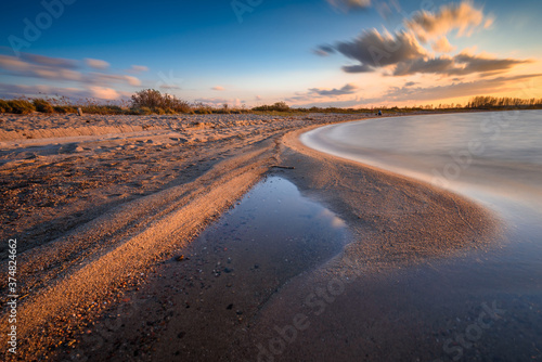 Baltic sea beach during sunset in Rewa. Baltic Sea. Poland © vivoo