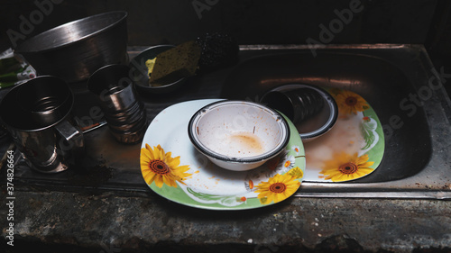 dirty bowl plates glasses dish washing © Faizan
