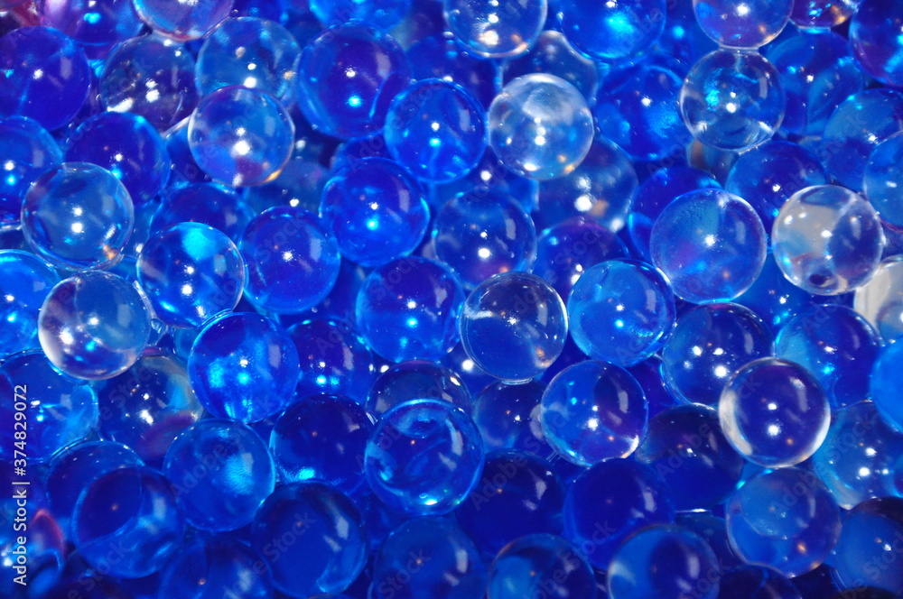 abstract background with bubbles.Blue jelly beads from a room fragrance device. Close-up image abstract background with bubbles.Blue jelly beads from a room fragrance device. Close-up image