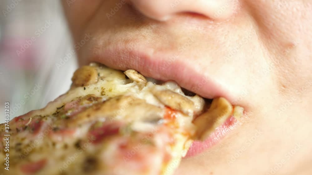 woman eat eating mouth close macro Pizza capricciosa cheese ham mushrooms woman eat eating mouth close macro Pizza capricciosa cheese ham mushrooms