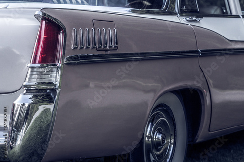 Partial rear view of a beautiful classic car from the fifties