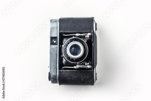 Top view of vintage cameras on white background