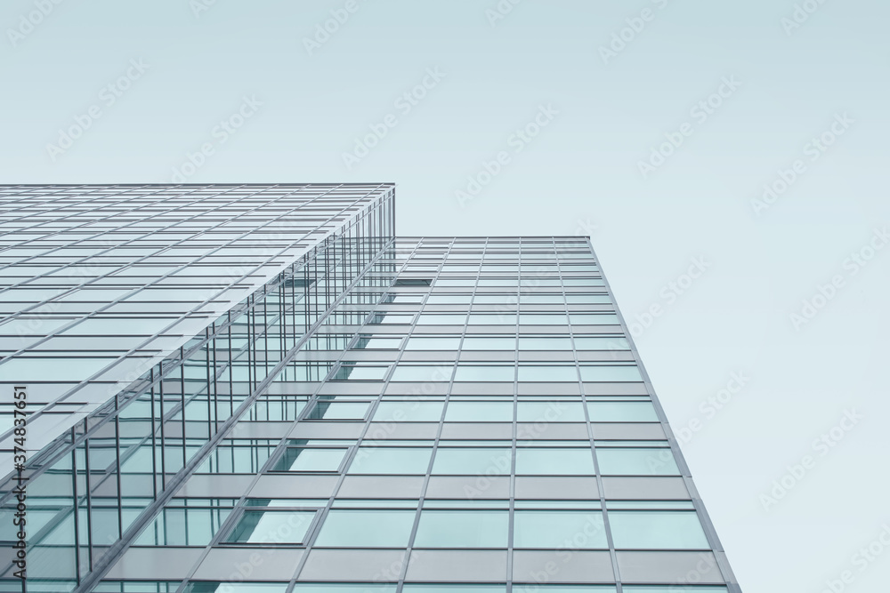 Modern glass building against the sky Modern glass building against the sky