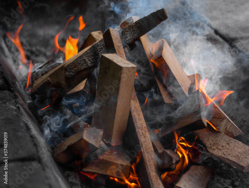 Burning сampfire wood on brazier