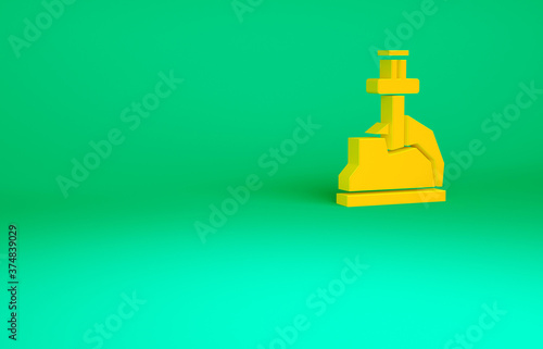 Orange Sword in the stone icon isolated on green background. Excalibur the sword in the stone from the Arthurian legends. Minimalism concept. 3d illustration 3D render.