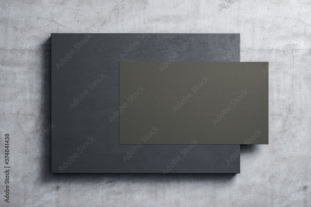 Empty black poster hanging on placard on concrete wall. - obrazy, fototapety, plakaty 