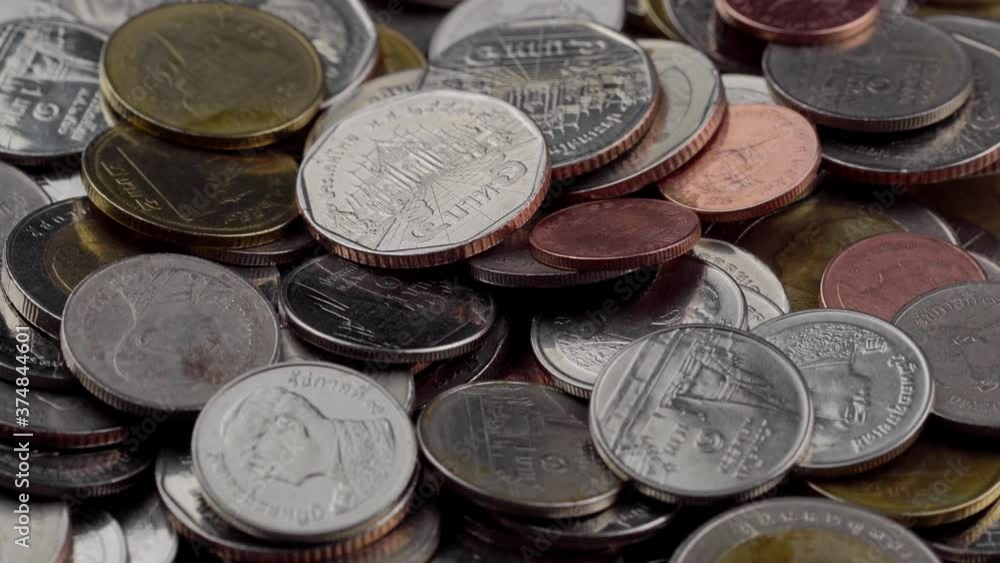 A collection of different coins as a rotating background
A collection of different coins as a rotating background