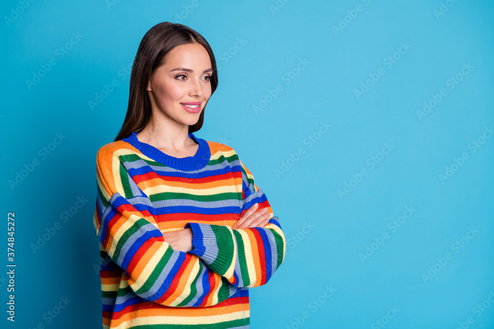 Turned photo of pretty charming dreamy girl worker cross hands enjoy working wear pullover isolated over blue color background Turned photo of pretty charming dreamy girl worker cross hands enjoy working wear pullover isolated over blue color background