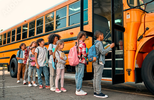 Children near school bus