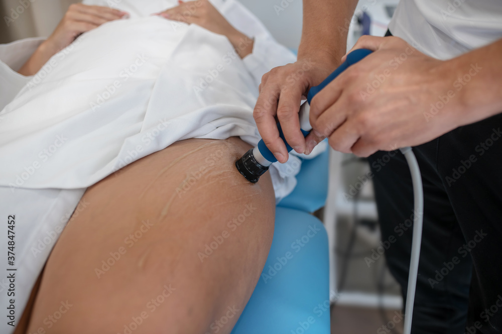 Fototapeta premium Woman receiving a beauty procedure in a specialized center