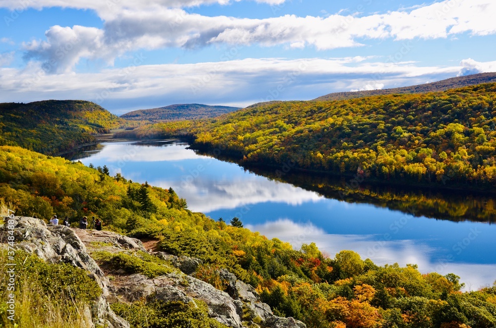 Lake of the Clouds in Porcupine Mountains Wilderness State Park, Michigan’s largest state park. Amazing natural beauty in fall season and gorgeous blue clouds reflection in water.
