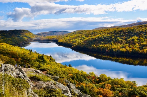 Lake of the Clouds in Porcupine Mountains Wilderness State Park, Michigan’s largest state park. Amazing natural beauty in fall season and gorgeous blue clouds reflection in water.