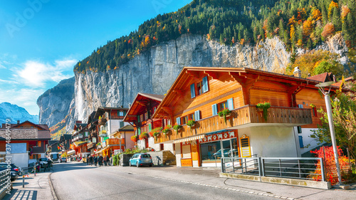 Fantastic autumn view of traditional swiss houses in Lauterbrunnen village.