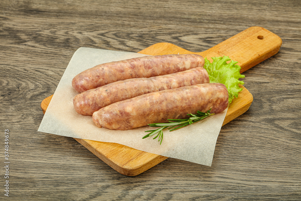 Raw pork meat sausages for grill Raw pork meat sausages for grill