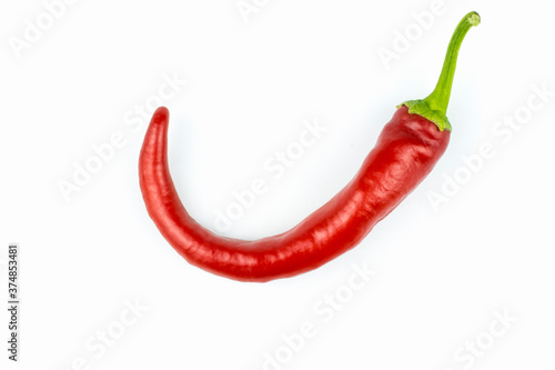 Ripe, red hot peppers isolated on a white background.