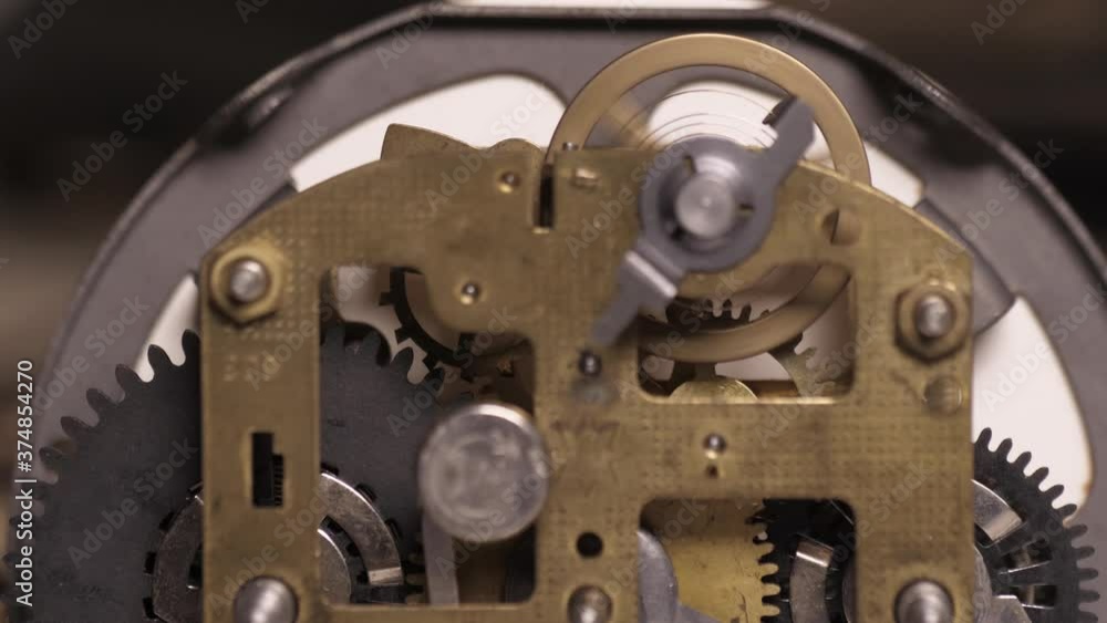 old clock mechanism with metal gears macro shot slow motion 4k old clock mechanism with metal gears macro shot slow motion 4k