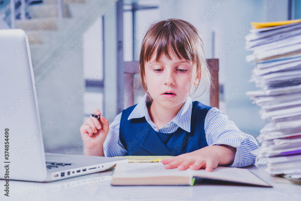 Office routine concept. Portrait of young business girl working overtime alone in office with a lot of documents. Horizontal image. Office routine concept. Portrait of young business girl working overtime alone in office with a lot of documents. Horizontal image.