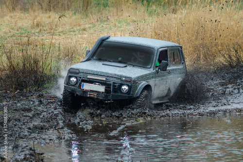 Off roading UTV in wet environment. Competition, fast. © Anton Tolmachov