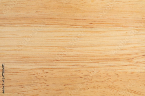 Close up of Natural light brown planks wood texture table background. Abstract surface rough pattern. 