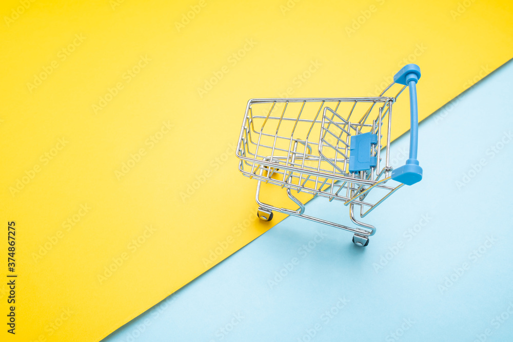 A shopping cart consumer shopping concept illustration on stylish contrast color background A shopping cart consumer shopping concept illustration on stylish contrast color background