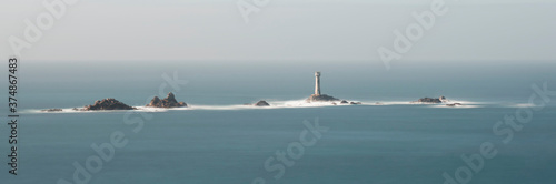 Lands End light house in milky sea on a cloudy day long exposure