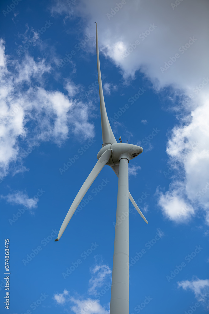Detailed close up view of a wind turbine; generator, rotor and blade view Detailed close up view of a wind turbine; generator, rotor and blade view