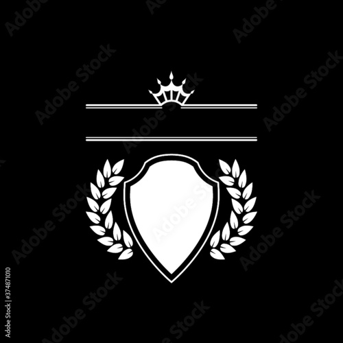 Abstract Royal shield badge isolated on dark background