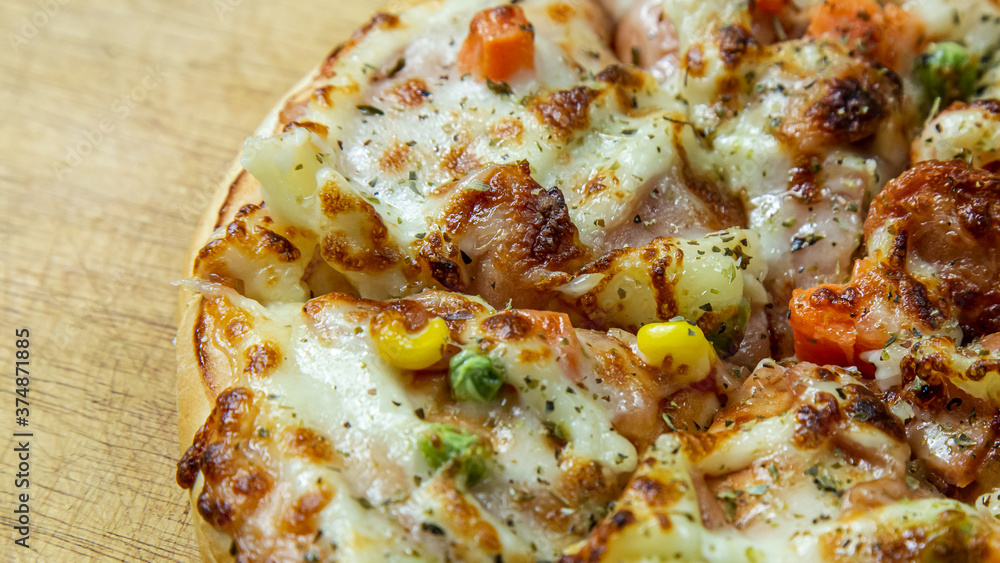 pizza on wood table close up image for food content. pizza on wood table close up image for food content.