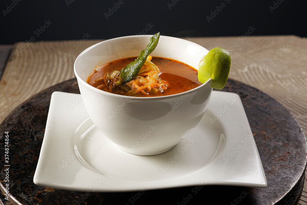 Shrimp broth and fish fillet with vegetables. Shrimp broth and fish fillet with vegetables.
