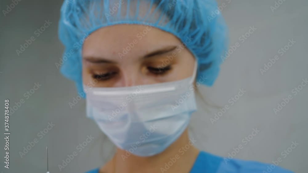 Nurse holding syringe and sprinkle up medicine Nurse holding syringe and sprinkle up medicine