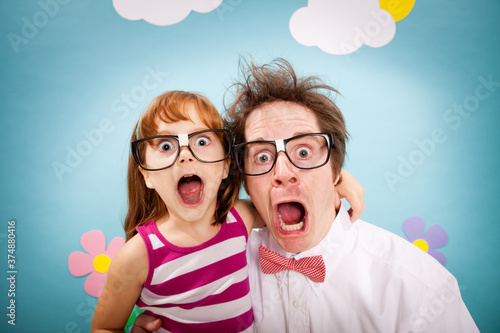 Shocked Nerdy Dad and Daughter in Imaginary Outside Wonderland World photo