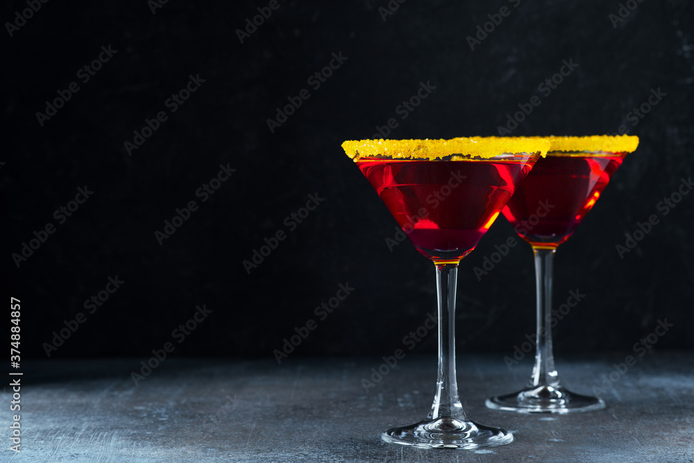 Halloween red coctail  in glass on dark background