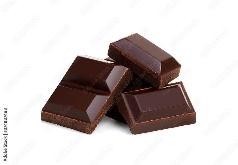 close up of chocolate pieces on white close up of chocolate pieces on white