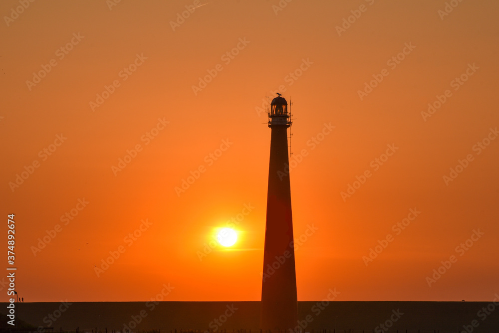 Sunset  over lighthouse of Den Helder, Holland