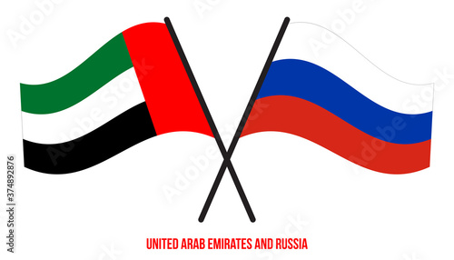 United Arab Emirates and Russia Flags Crossed And Waving Flat Style. Official Proportion.
